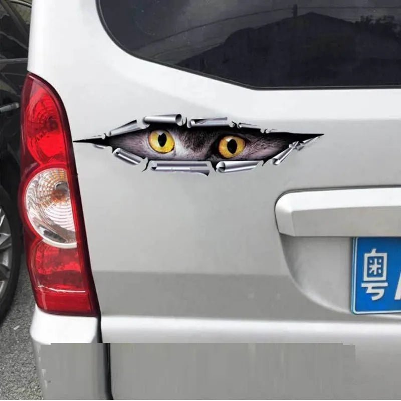 3D Tiger Eye and Eagle Eye pattern car bumper stickers measuring 10x35cm on vehicle door