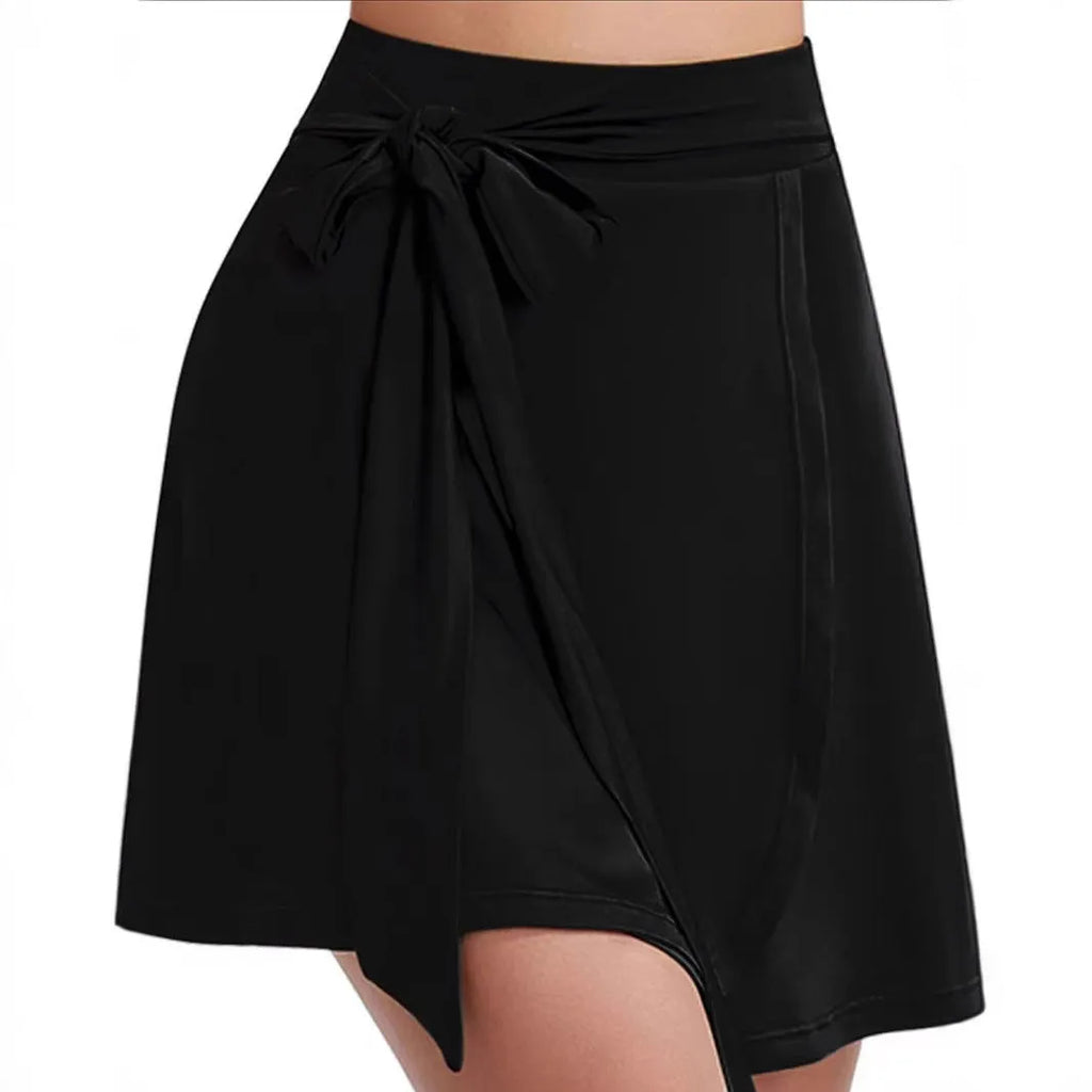 Black thigh-length sports skirt with high waist and integrated shorts for anti-exposure coverage during sports