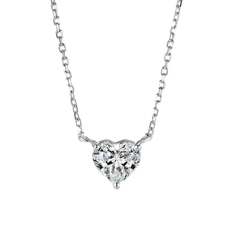 Women's simple heart-shaped copper necklace with a silver colour finish on a white background.