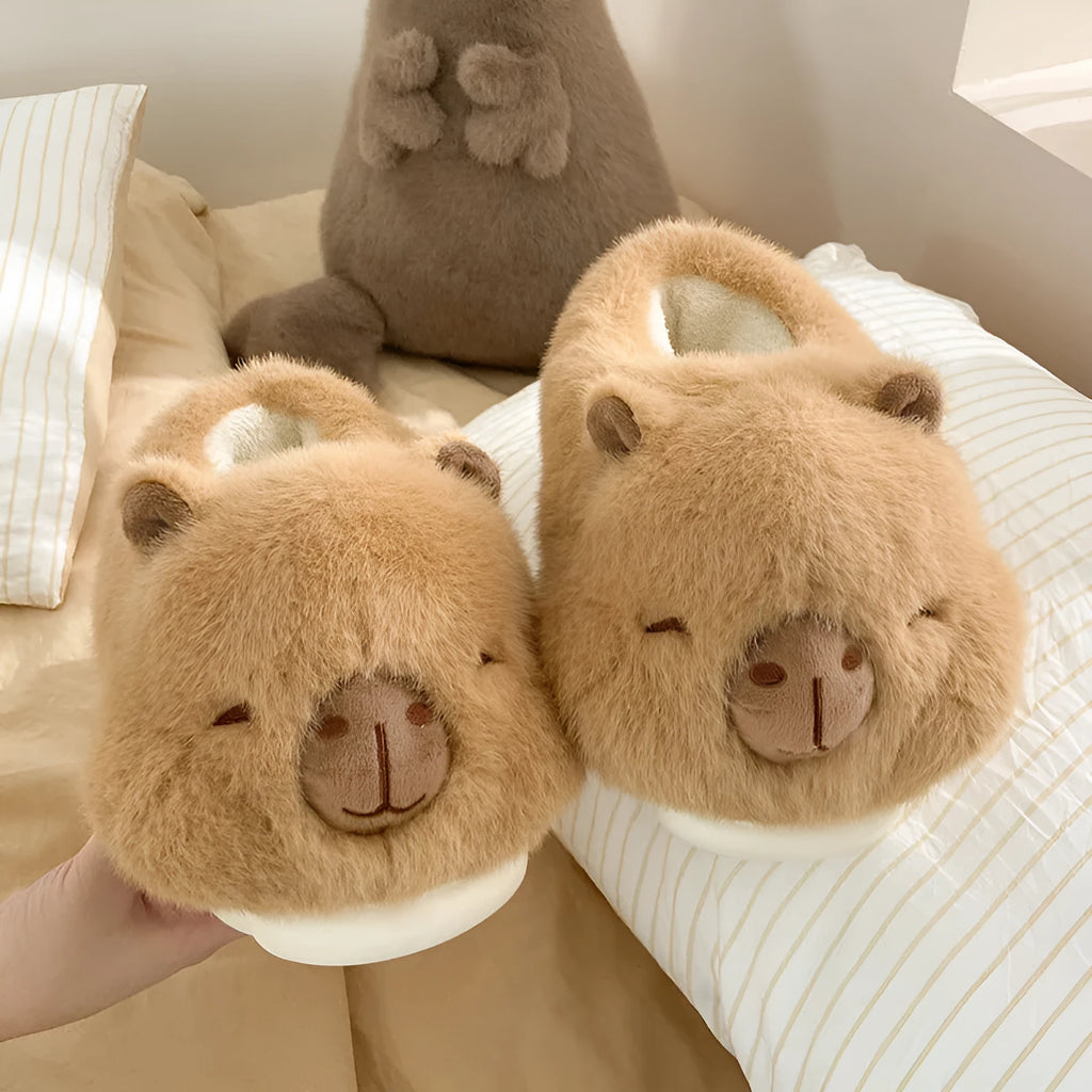 Light brown women's winter slippers with a cartoon pattern, plush upper, and wool lining.