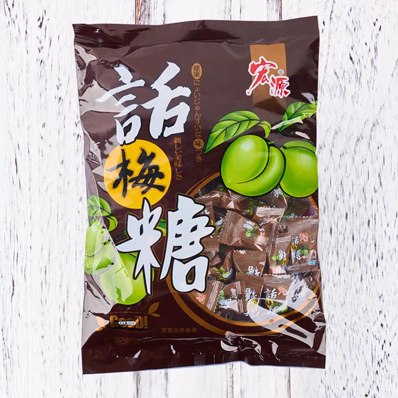 Bag containing three packs of hard candy: guava flavour, plum sugar, and tangerine peel candy, totalling 1055g.
