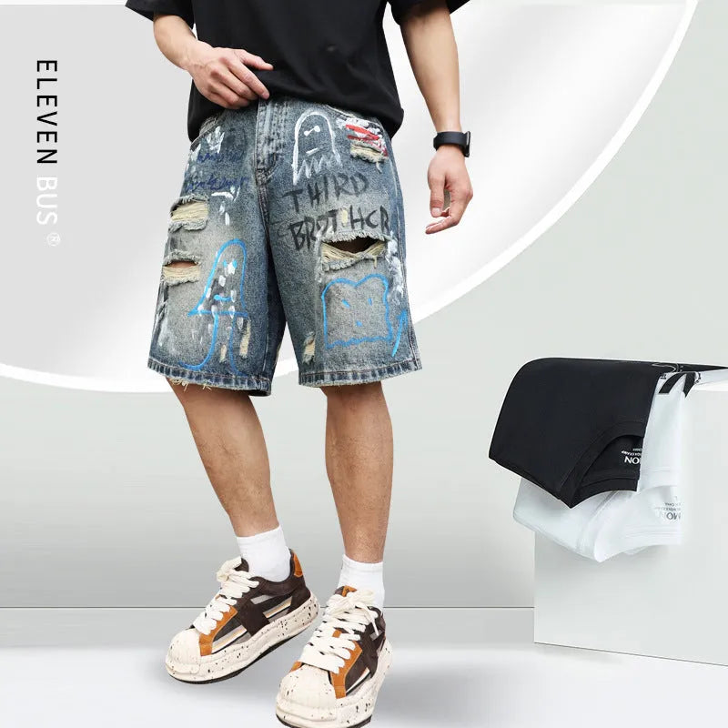 Blue denim shorts for men with ripped detailing and a straight leg cut.