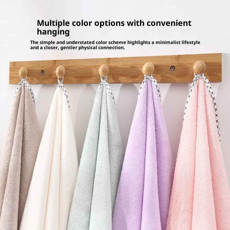 High density coral fleece three-piece towel set in solid vanilla colour with one bath towel and two hand towels