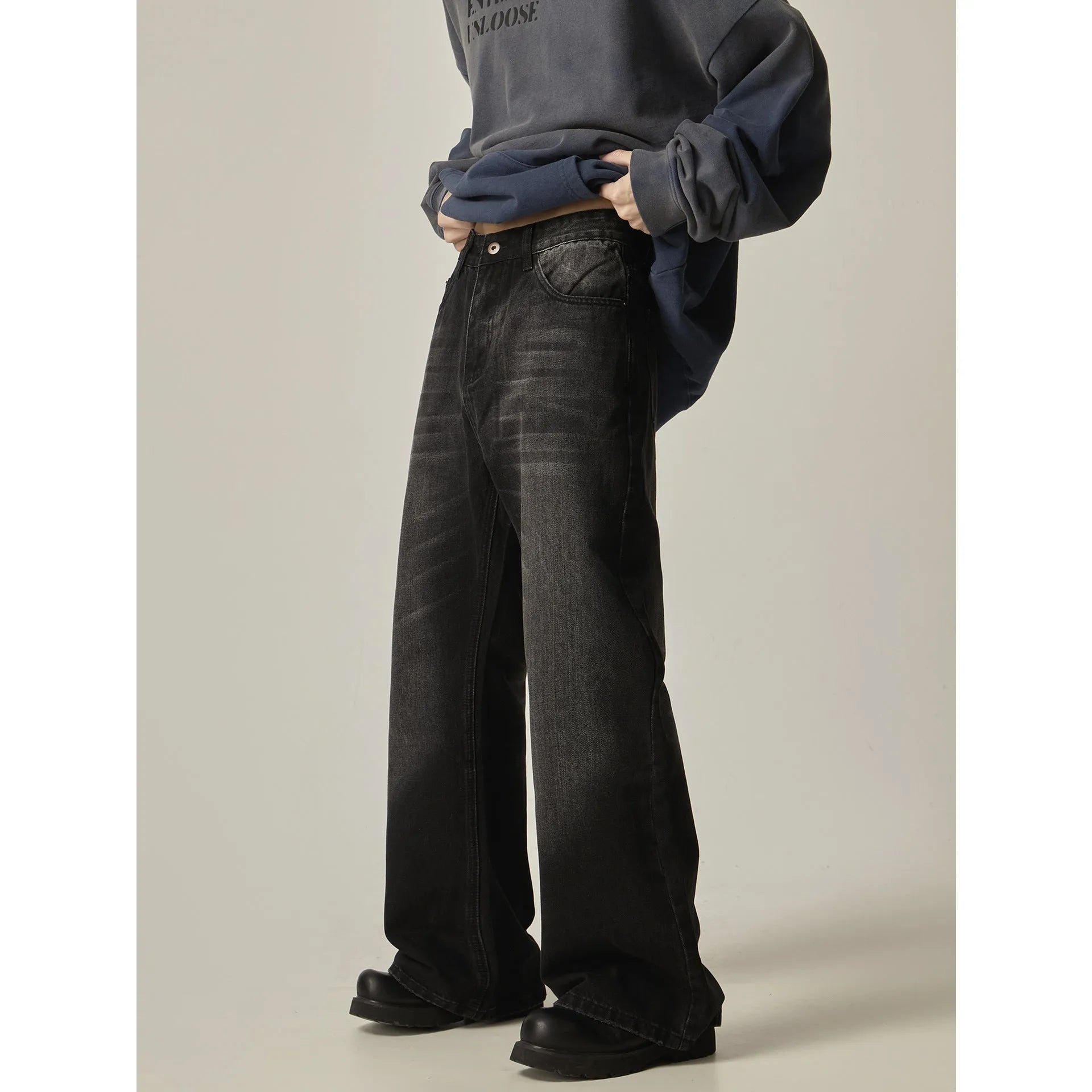 Black straight-leg jeans with American retro styling and zipper fly