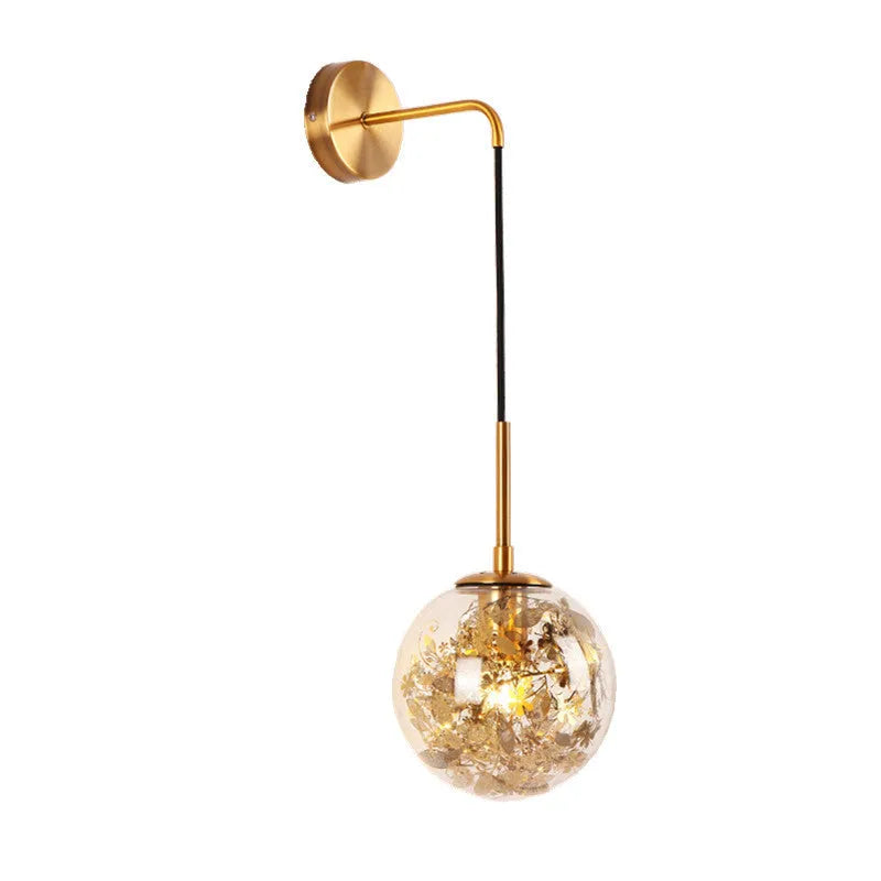 Modern glass wall lamp in golden flower finish, 20cm diameter, mounted on wall