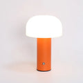 USB-powered dual-purpose table lamp in black, green, orange, or white colour with charging function