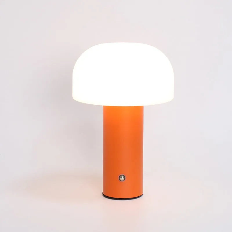 USB-powered dual-purpose table lamp in black, green, orange, or white colour with charging function
