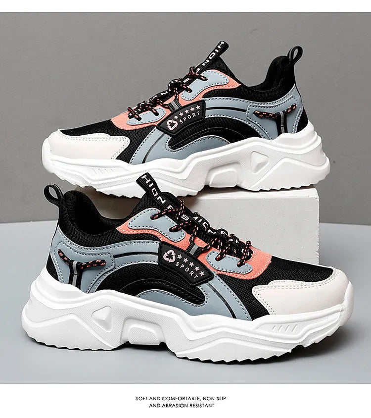 Women's white and black casual mesh sports shoes with a thick PU sole and buckle.