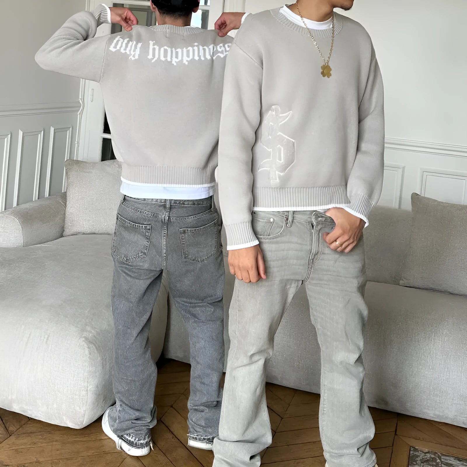 Grey loose-fitting jacquard knitwear pullover coat with long sleeves for autumn winter wear.