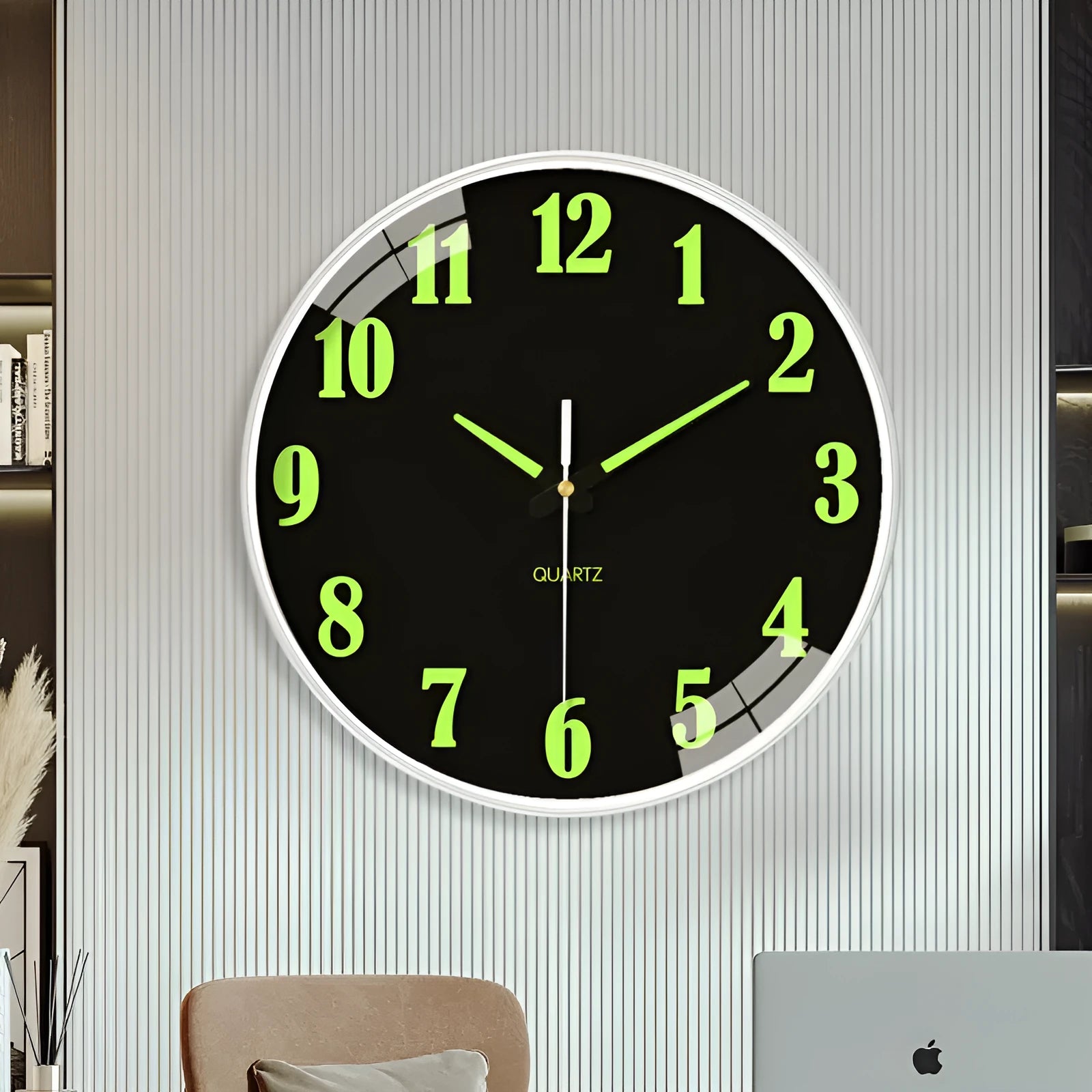 Modern 8 inch diameter luminous wall clock with plastic shell on a wall.