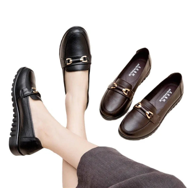 Black flat heel pumps with soft microfiber upper, round toe, and metal accent, low 1-3cm heel