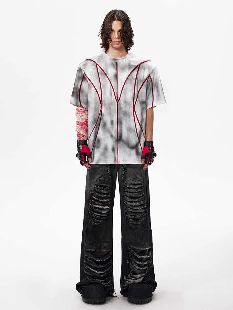 Padded shoulder short sleeve t-shirt with textured line patchwork design and round neck.