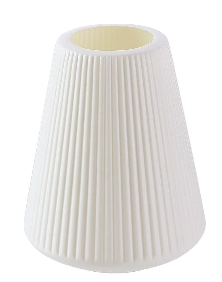Colourful melamine plastic decorative flower vase measuring 16x20cm on desktop