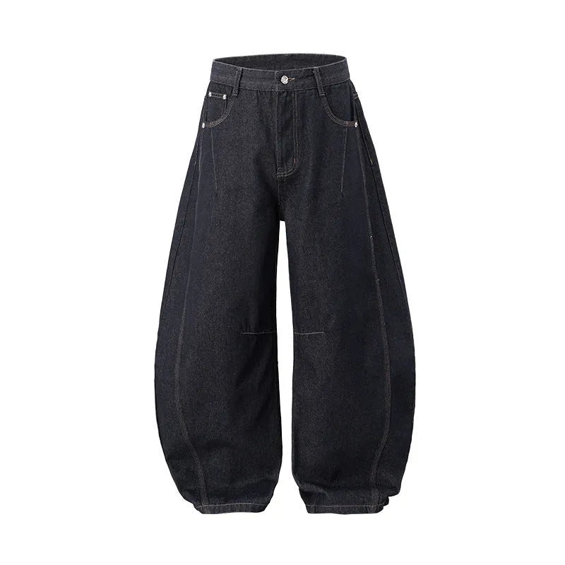 Men's wide leg denim trousers in original cow colour, showing mid waist and relaxed fit.