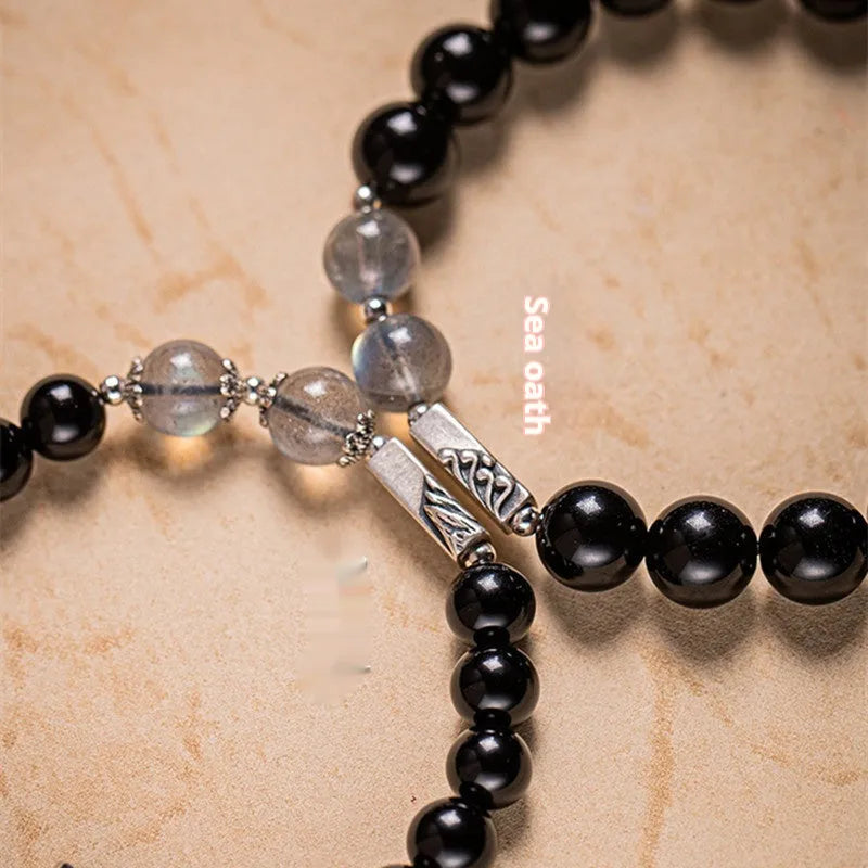 Black obsidian Buddha beads couple bracelets with 8mm and 10mm beads on adjustable cords