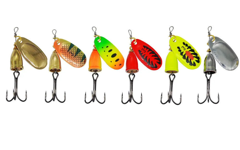R composite rotating sequins copper bell metal fishing lure in multiple colour options on a tackle box.
