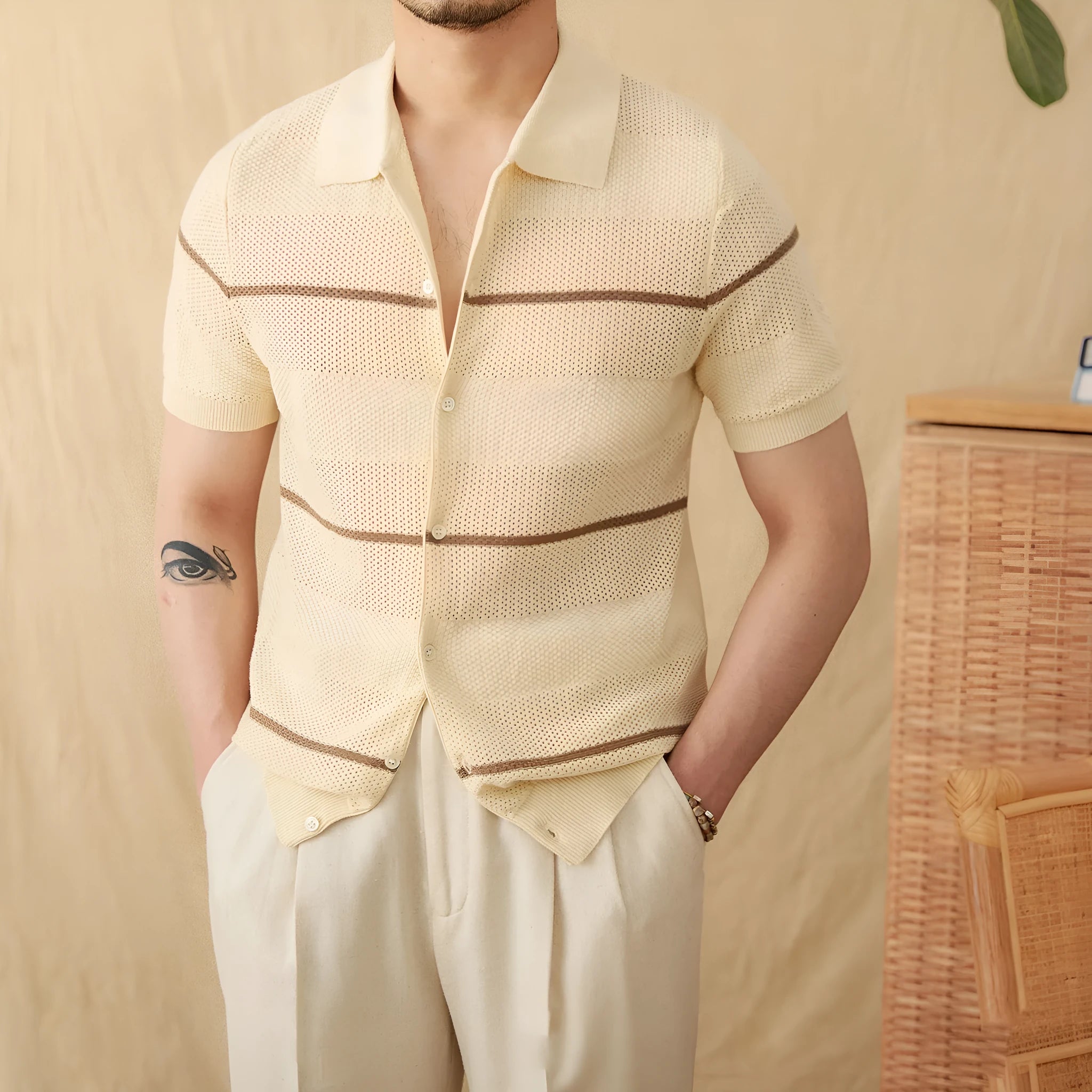 Cotton linen short sleeve knitted cardigan in camel with open front and lapel collar on a male model