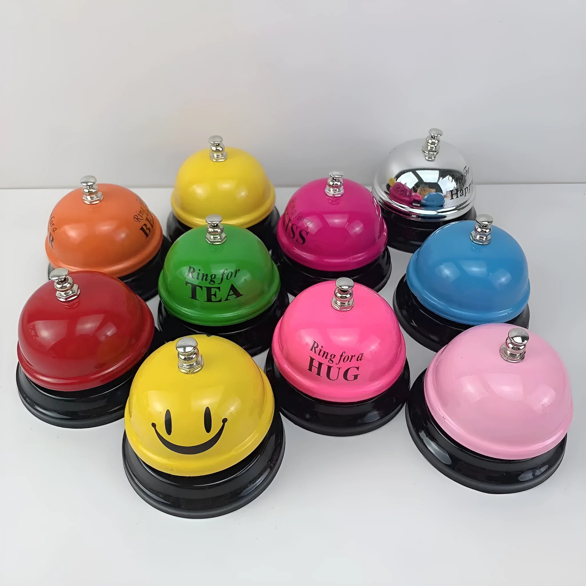 Iron game alarm bell in one of 11 available colours including red, blue, green, pink, and yellow.