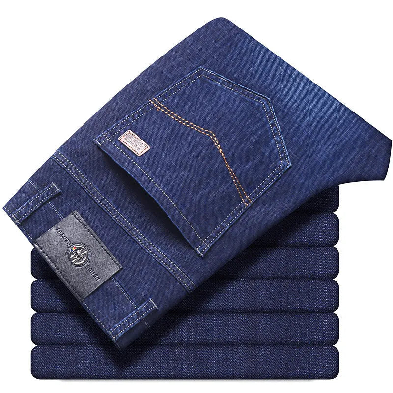 Women's loose fit black stretch jeans with a straight leg and zip fly, shown on a hanger.