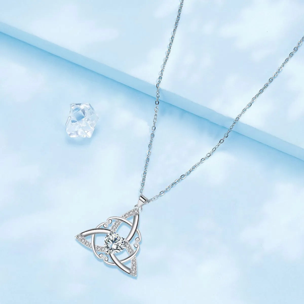 Women's Celtic knot necklace with geometric copper pendant in choice of four electroplated colours.