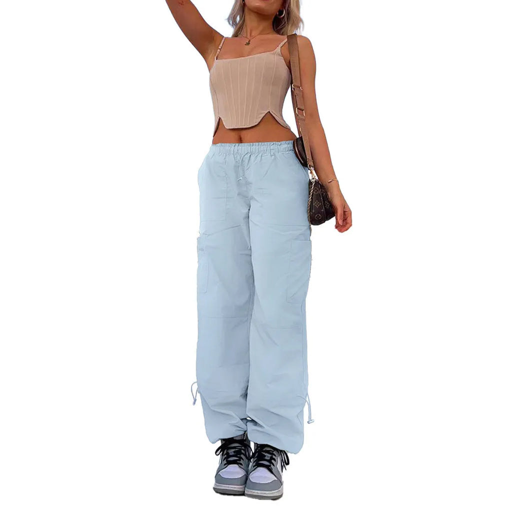 Loose fit straight-leg multi-pocket cargo casual pants in polyester fabric.
