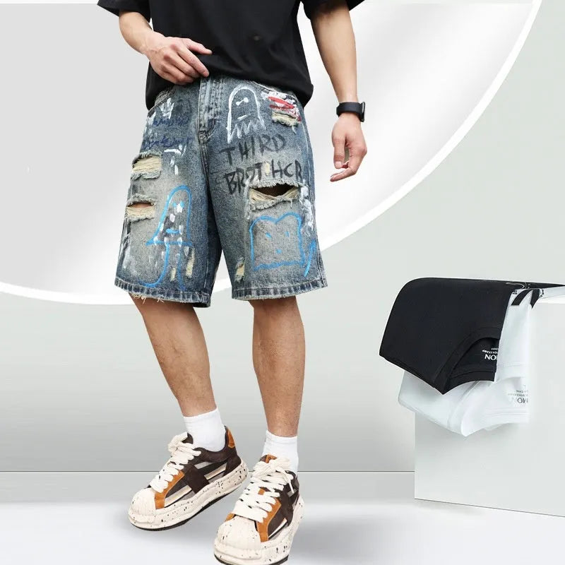 Blue denim shorts for men with ripped detailing and a straight leg cut.