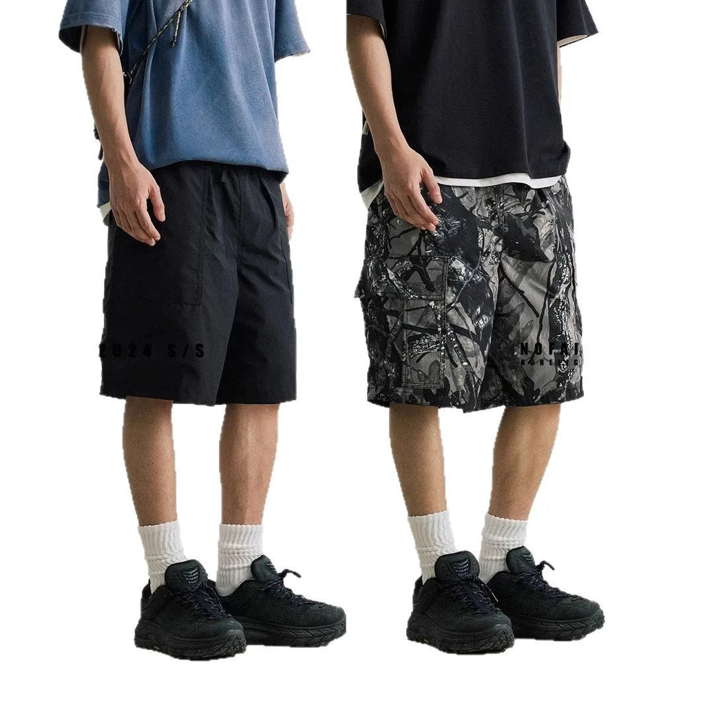 Men's straight-leg denim shorts with elastic waistband in black or army green
