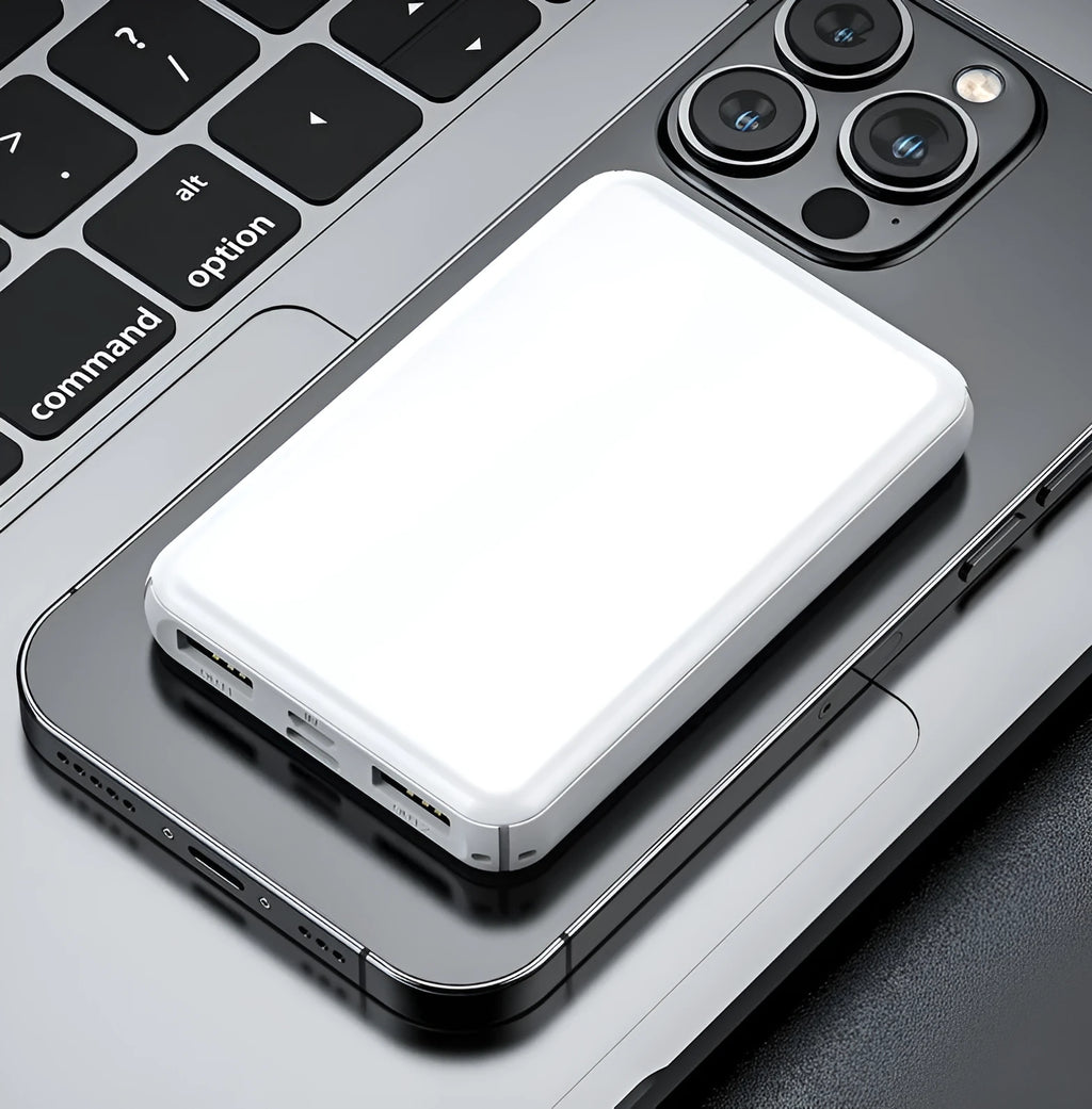 Black electric heating vest power bank with capacity display next to a white vest.