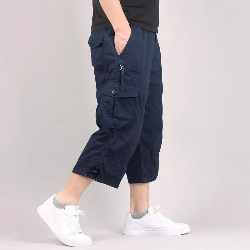 Men's cropped cotton sports pants in khaki, loose cropped length, front view