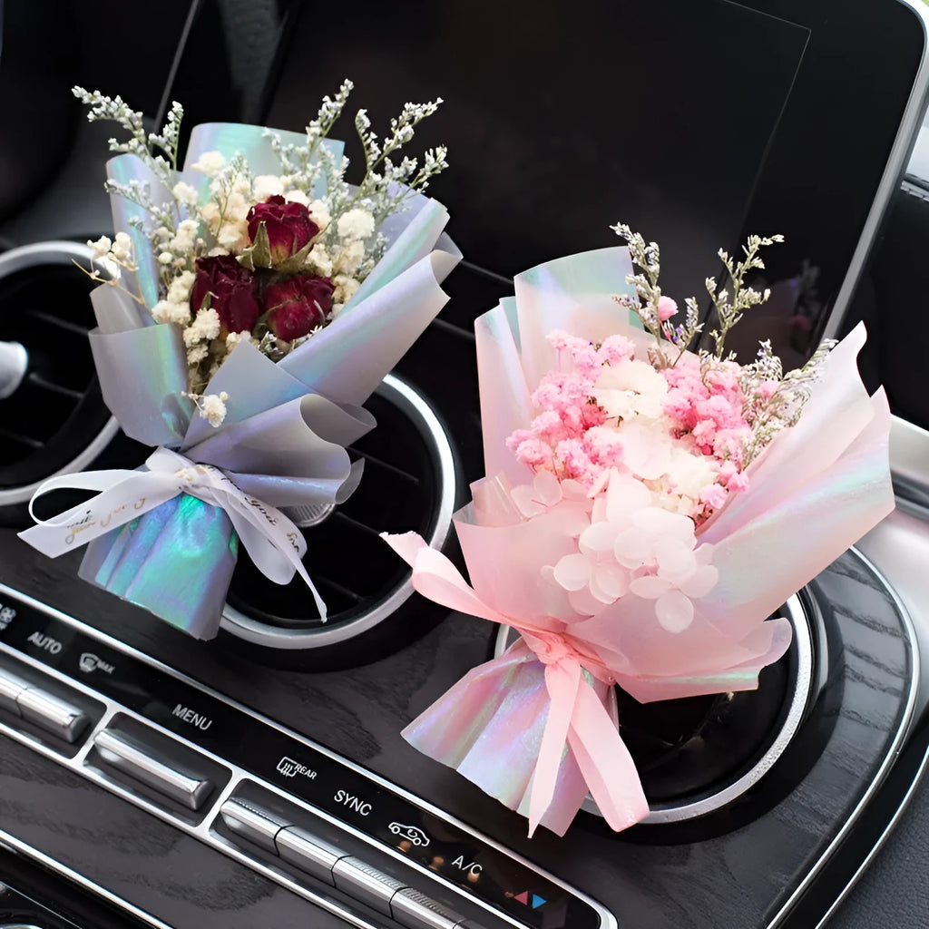 Handmade dried flower bouquet car vent clip air freshener in various colours.