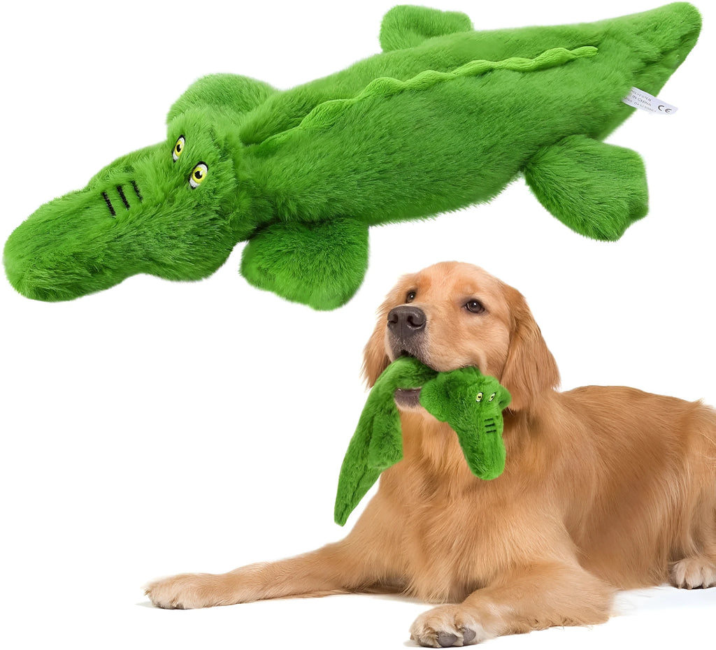 Green plush crocodile dog toy with no stuffing, featuring a squeaker head and crinkle paper tail.