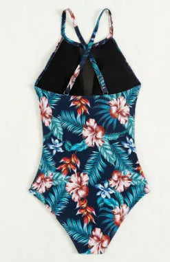 Women's deep V-neck one-piece swimsuit in a printed gradient pattern, showing European/American fit.