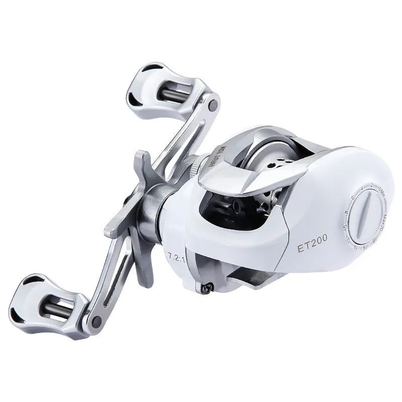 Small white ET Drop Wheel micro bait casting fishing reel on a neutral background.