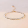 Natural gray moonstone diamond-shaped beads on a silver bracelet with clasp