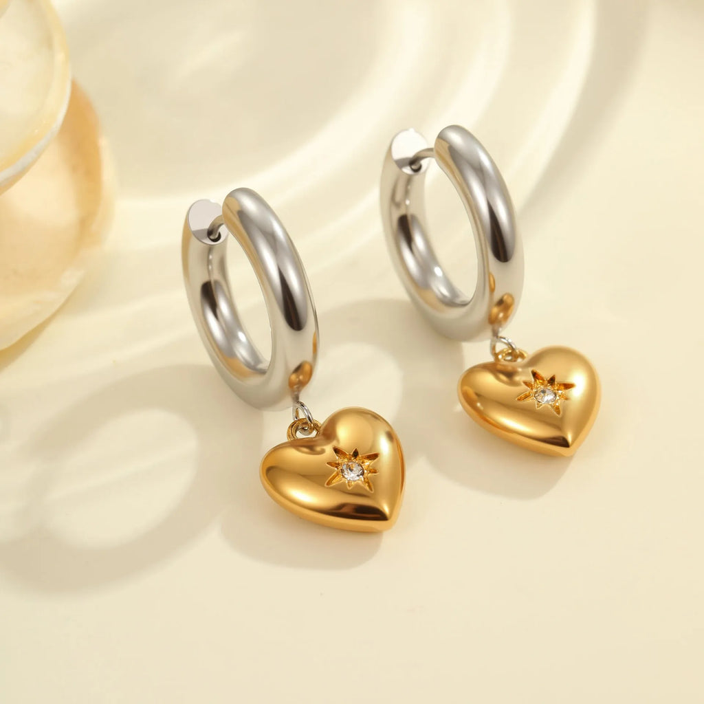 Women's stainless steel drop earrings with 18K gold electroplating in Christmas tree and heart shapes.