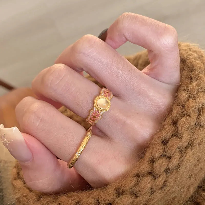 Open geometric ring with pink crystal enamel on copper gold plating for women