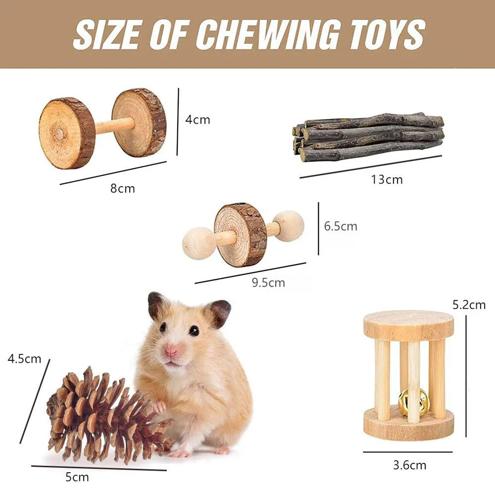 Assortment of natural wooden chew toys for small pets including balls and woven items on a straw mattress.