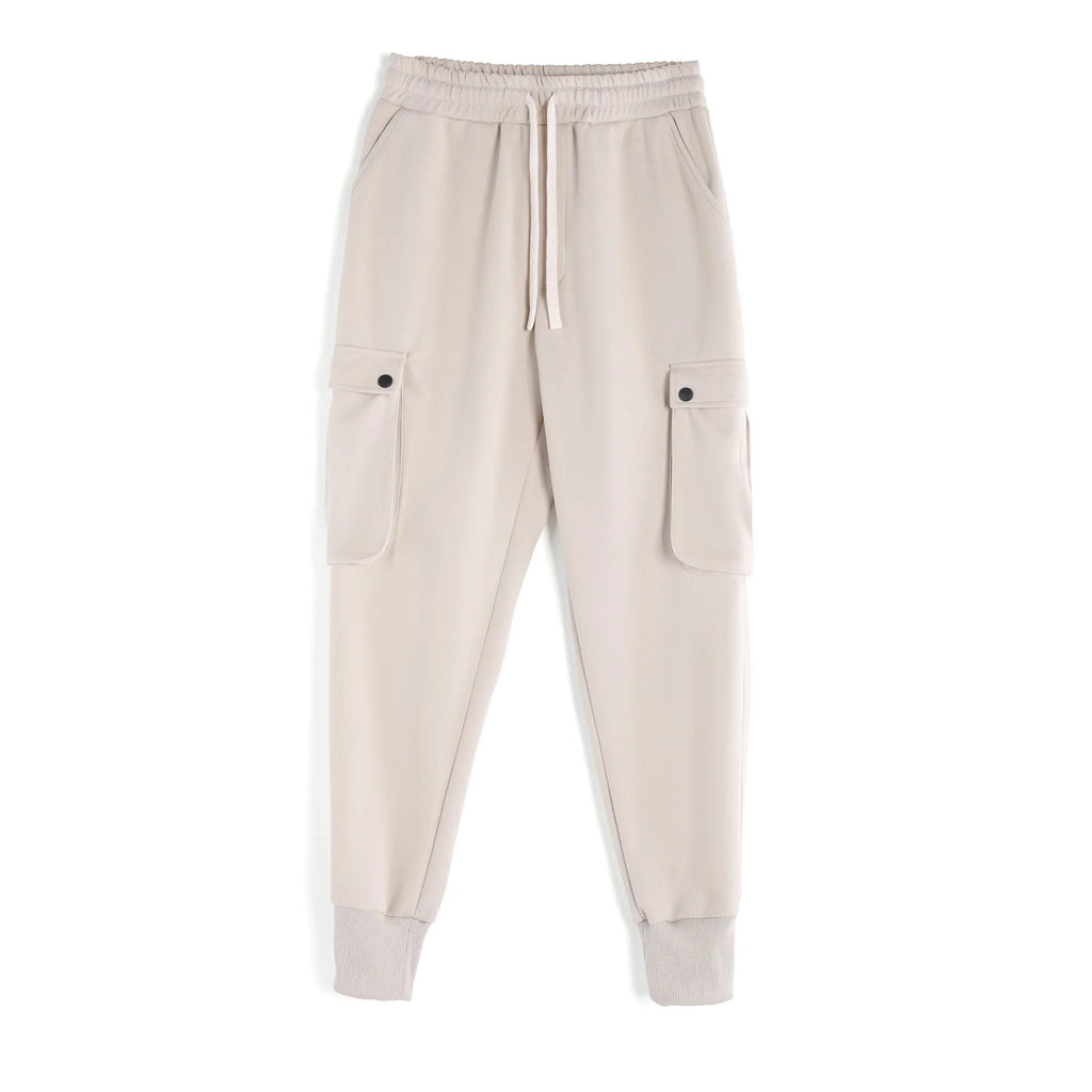 Men's loose fit American sports trousers with ankle ties in apricot colour showing multi-pocket design