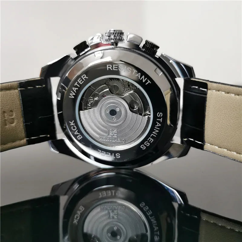 Men's automatic mechanical watch with silver case and white dial showing 12mm thickness