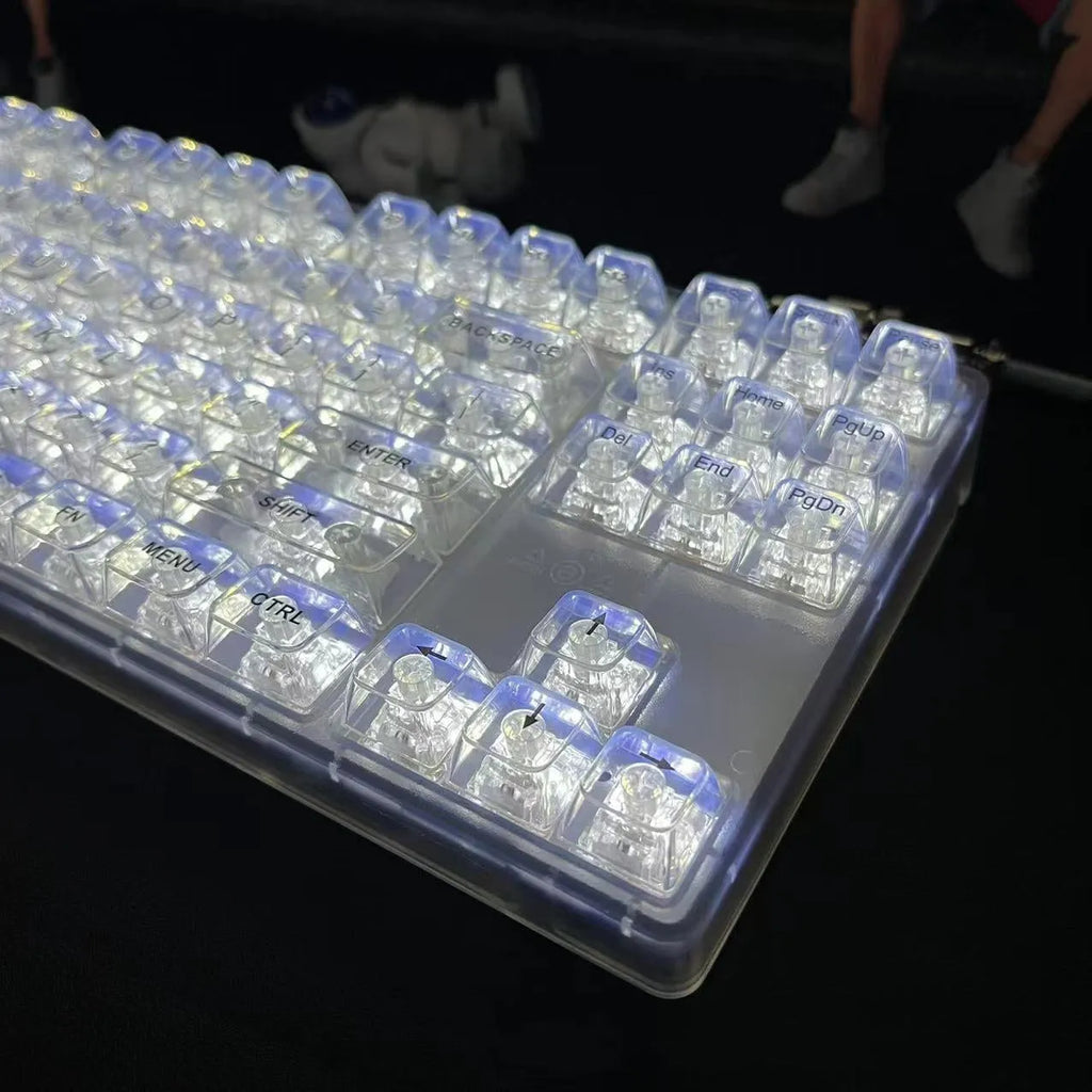 132 transparent plastic key caps for mechanical keyboard customisation arranged in full keyboard layout