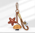 Handmade soda bread creative style handbag pendant with cartoon food designs and brown carrying strap