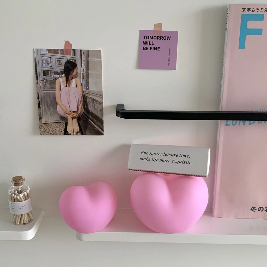 Pink and white vinyl atmosphere lamp creating a warm glow for decorative lighting.