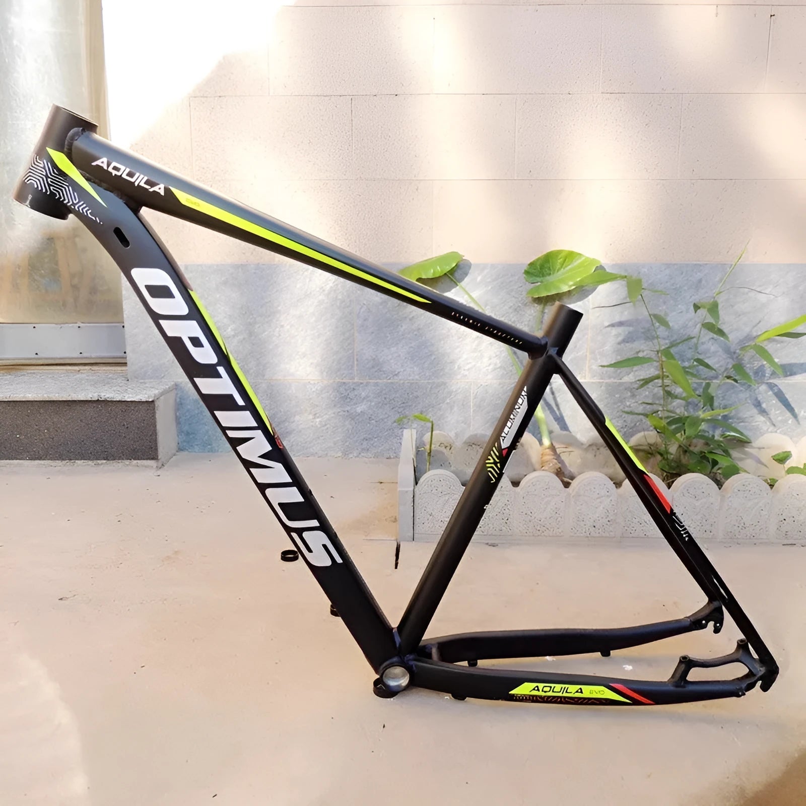 Black Green aluminium mountain bike frame for 29-inch wheels with disc brake mount and internal cable routing ports