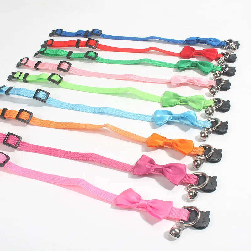 Multi-colour striped nylon bow collar with bell for cats on adjustable ribbon