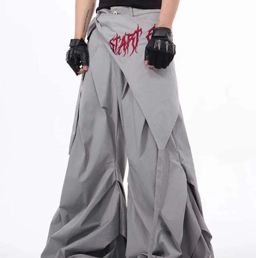 Korean-style black wide-leg summer function pants for boys displayed flat