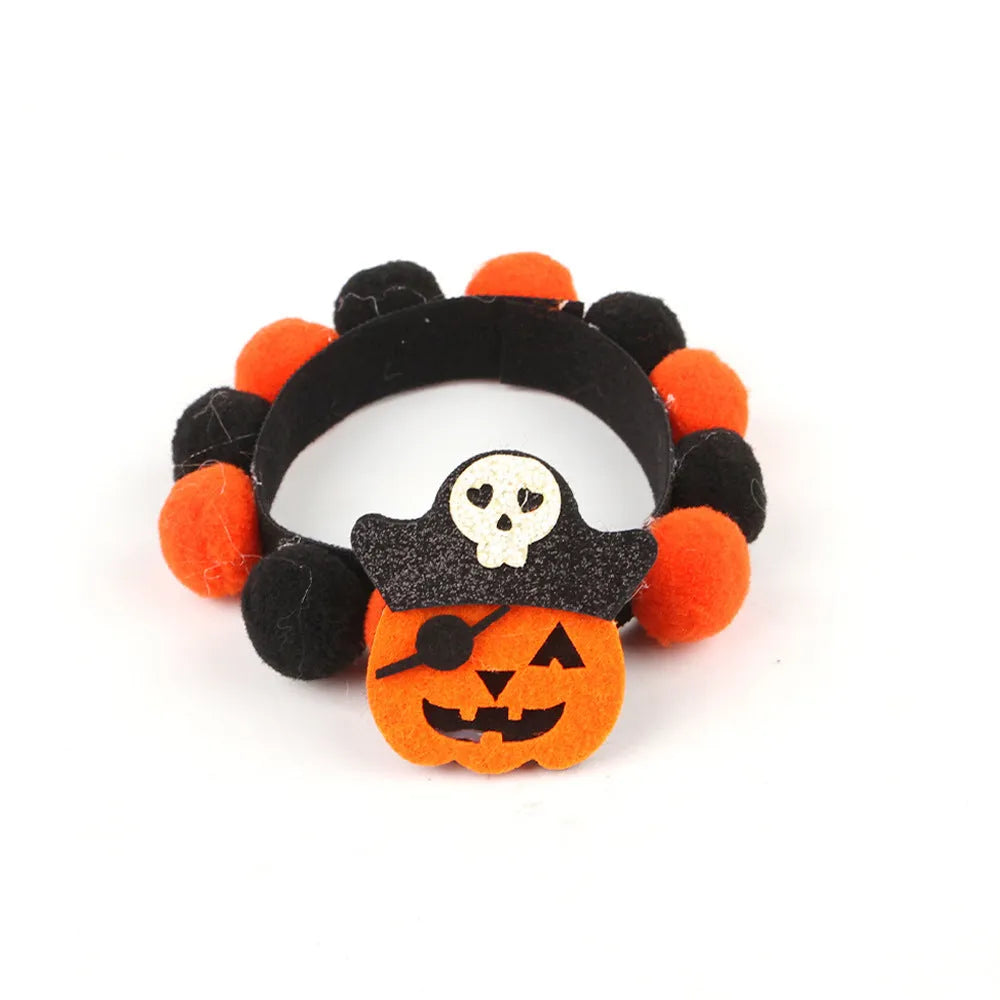 Halloween pet fur ball collar in coarse powder pumpkin colour on a cat, with soft textured design