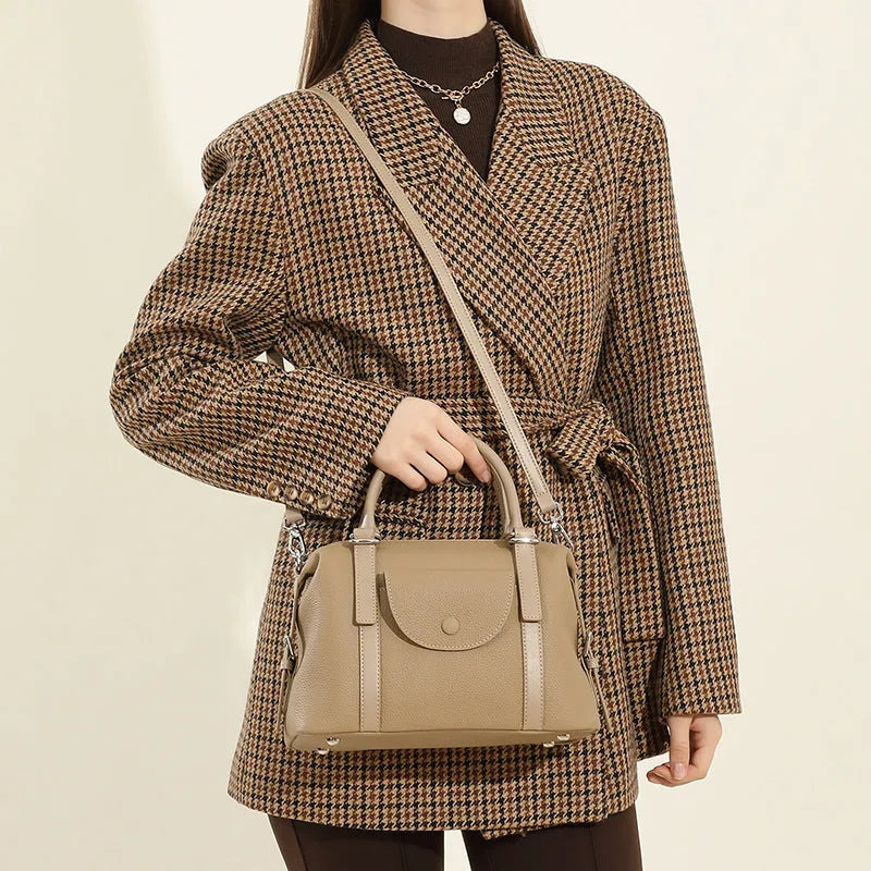 Genuine leather women's handbag in black, grey, or brown with contrast stitching