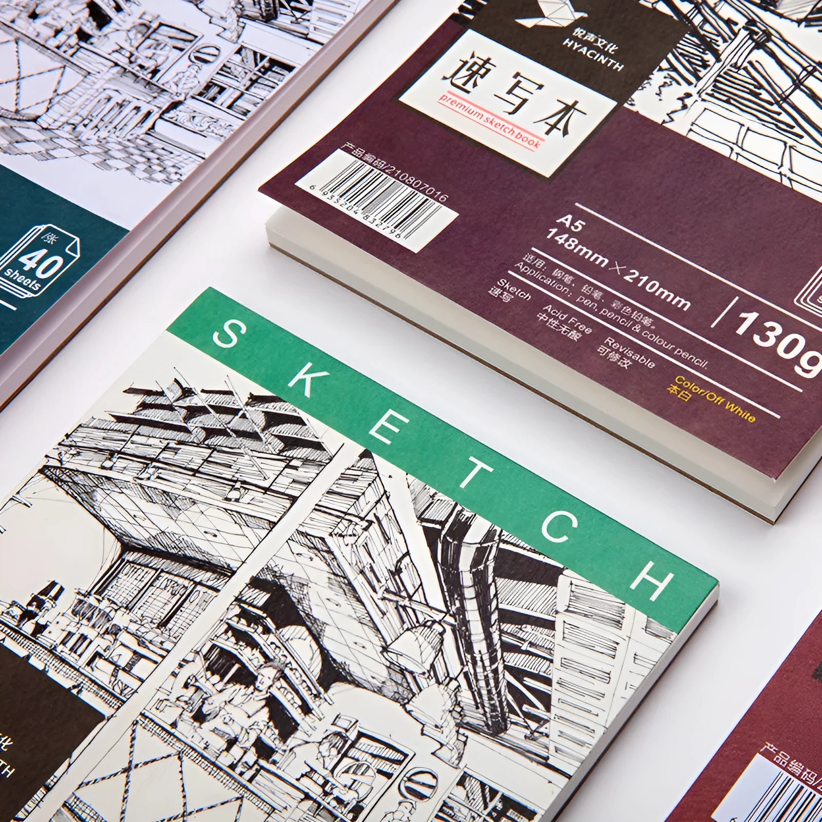 A4 coil bound drawing book with blank pages, open flat on a desk