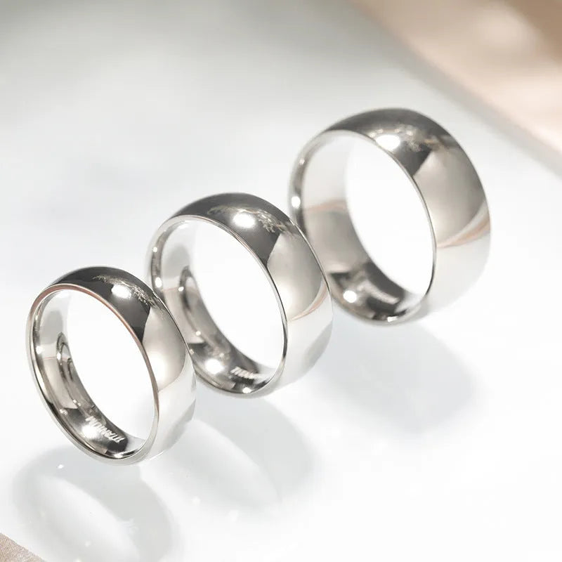 Silver titanium steel ring showing three width options: 2mm, 4mm, and 6mm bands