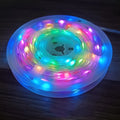 Colourful LED light string with 100 bulbs on a 10-metre wire, showing battery pack and multiple mode settings.